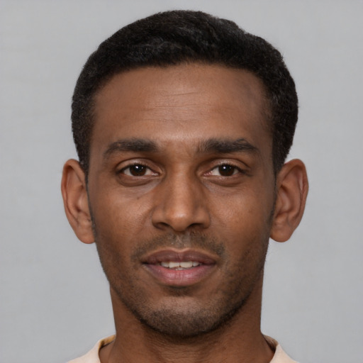 Neutral latino young-adult male with short  brown hair and brown eyes