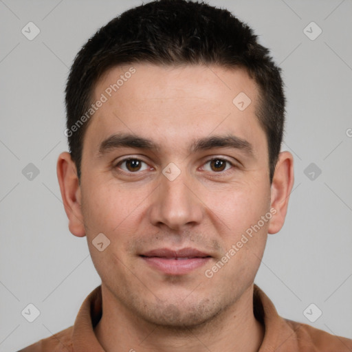 Joyful white young-adult male with short  brown hair and brown eyes