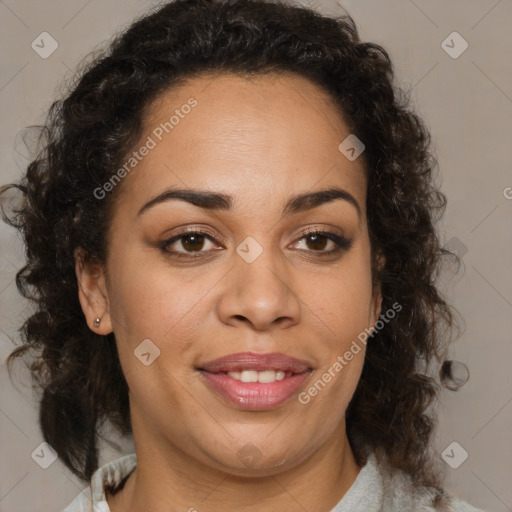 Joyful black adult female with medium  brown hair and brown eyes