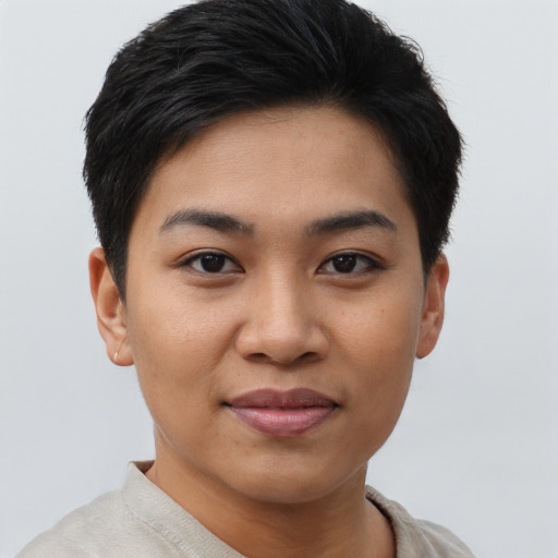 Joyful asian young-adult female with short  brown hair and brown eyes