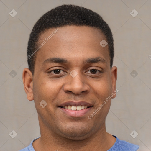 Joyful latino young-adult male with short  brown hair and brown eyes