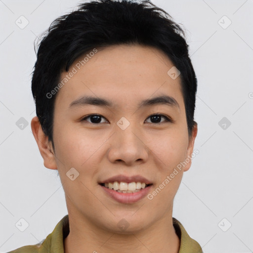 Joyful asian young-adult male with short  black hair and brown eyes