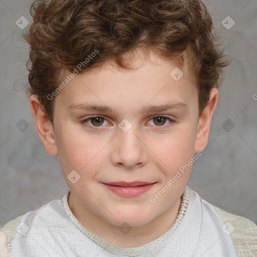 Joyful white child male with short  brown hair and grey eyes