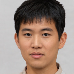 Neutral asian young-adult male with short  brown hair and brown eyes