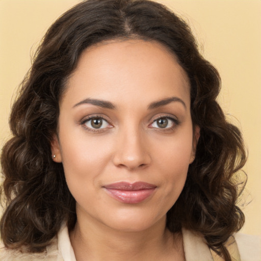 Joyful white young-adult female with medium  brown hair and brown eyes