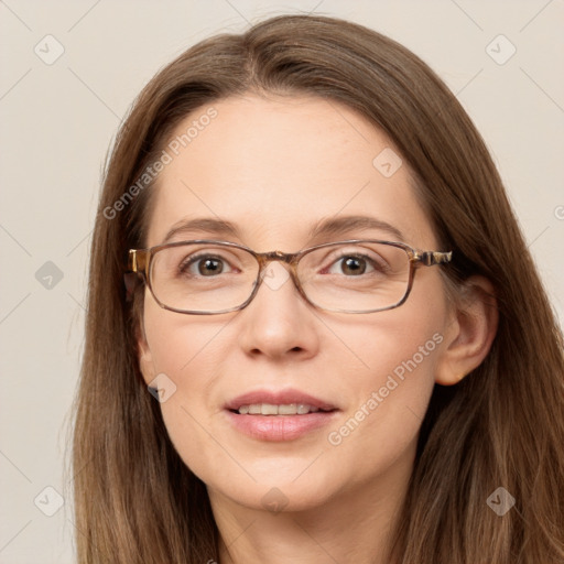 Joyful white adult female with long  brown hair and brown eyes