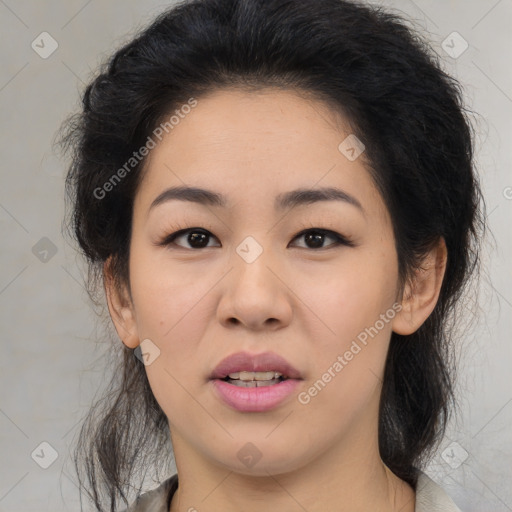 Joyful asian young-adult female with medium  black hair and brown eyes