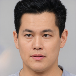 Neutral asian young-adult male with short  black hair and brown eyes