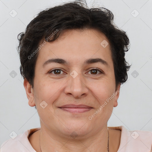 Joyful white adult female with short  brown hair and brown eyes