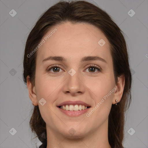 Joyful white young-adult female with medium  brown hair and brown eyes