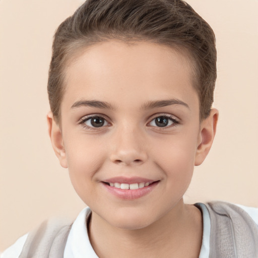 Joyful white child female with short  brown hair and brown eyes