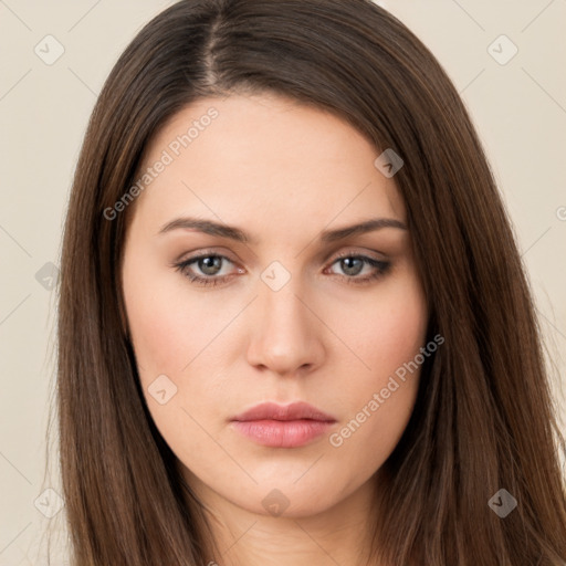 Neutral white young-adult female with long  brown hair and brown eyes