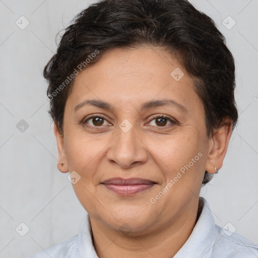 Joyful white adult female with short  brown hair and brown eyes