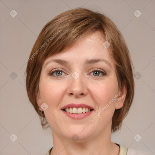 Joyful white young-adult female with medium  brown hair and blue eyes