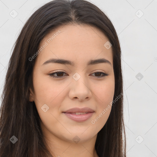 Joyful asian young-adult female with long  brown hair and brown eyes