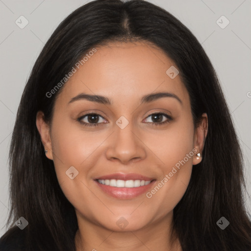 Joyful latino young-adult female with long  brown hair and brown eyes