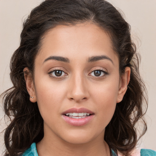 Joyful white young-adult female with medium  brown hair and brown eyes