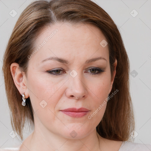 Joyful white young-adult female with medium  brown hair and blue eyes