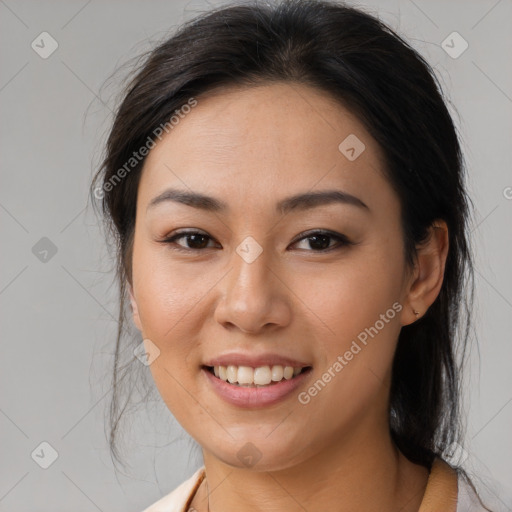 Joyful white young-adult female with medium  brown hair and brown eyes