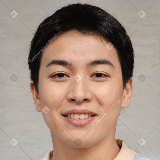 Joyful asian young-adult male with short  black hair and brown eyes