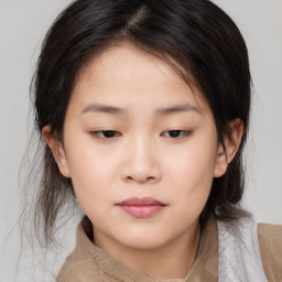 Neutral asian young-adult female with medium  brown hair and brown eyes