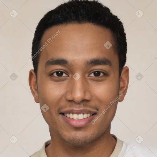 Joyful latino young-adult male with short  black hair and brown eyes