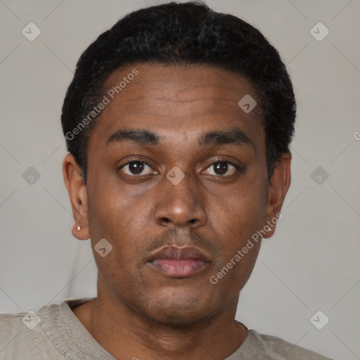 Neutral black young-adult male with short  black hair and brown eyes
