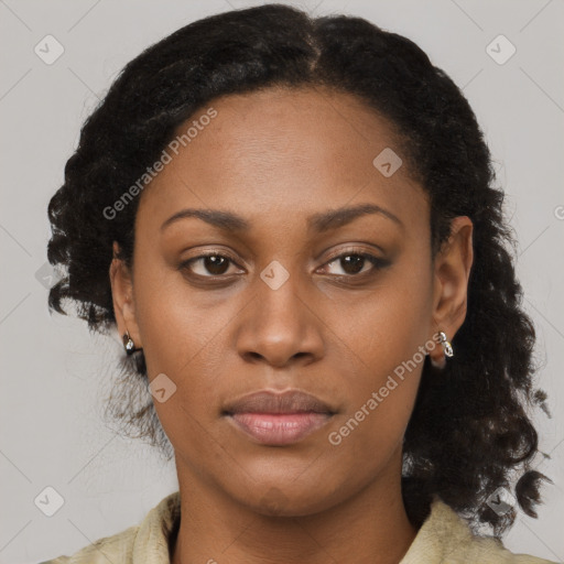 Joyful black young-adult female with medium  brown hair and brown eyes