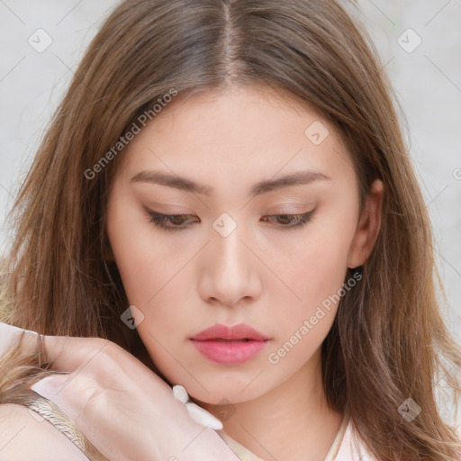 Neutral white young-adult female with long  brown hair and brown eyes