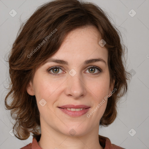 Joyful white young-adult female with medium  brown hair and green eyes