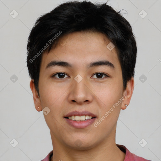 Joyful asian young-adult male with short  black hair and brown eyes