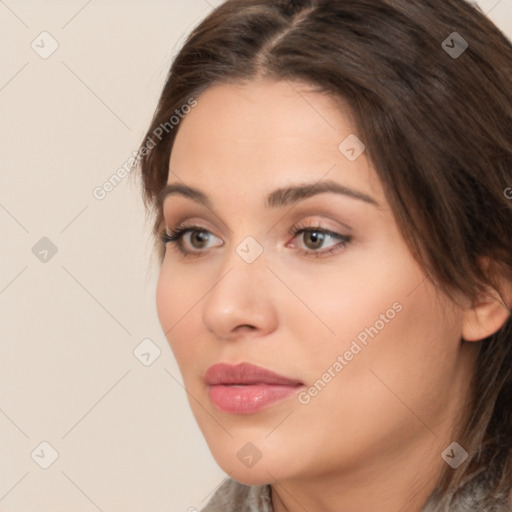 Neutral white young-adult female with medium  brown hair and brown eyes