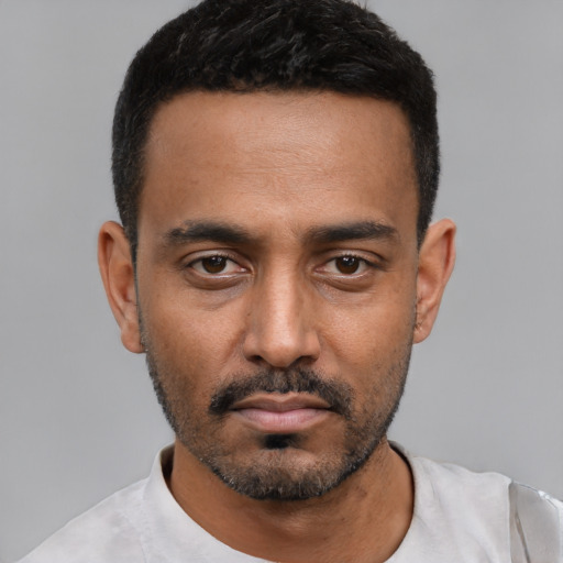Neutral black young-adult male with short  black hair and brown eyes