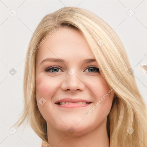 Joyful white young-adult female with long  brown hair and blue eyes