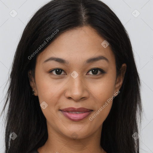 Joyful asian young-adult female with long  brown hair and brown eyes