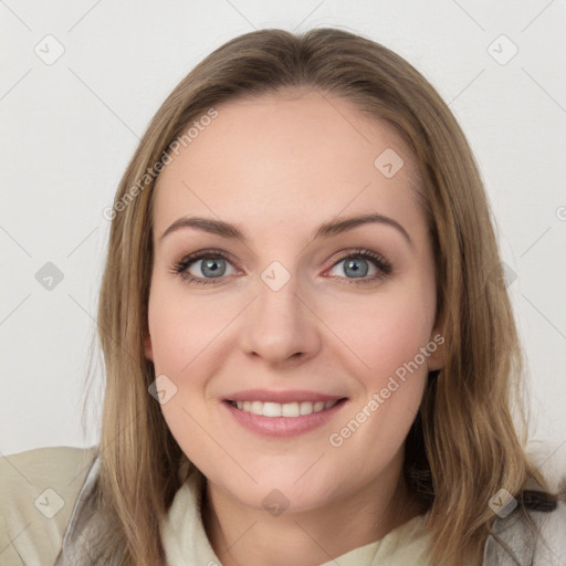 Joyful white young-adult female with long  brown hair and blue eyes