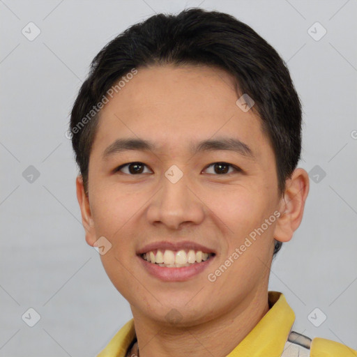 Joyful asian young-adult male with short  brown hair and brown eyes