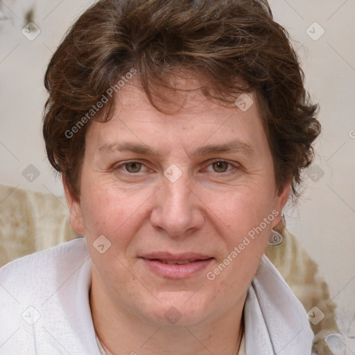 Joyful white adult female with medium  brown hair and blue eyes