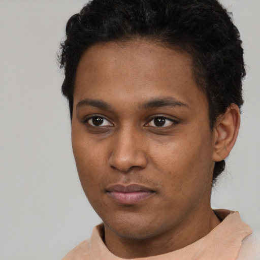 Neutral black young-adult male with short  brown hair and brown eyes