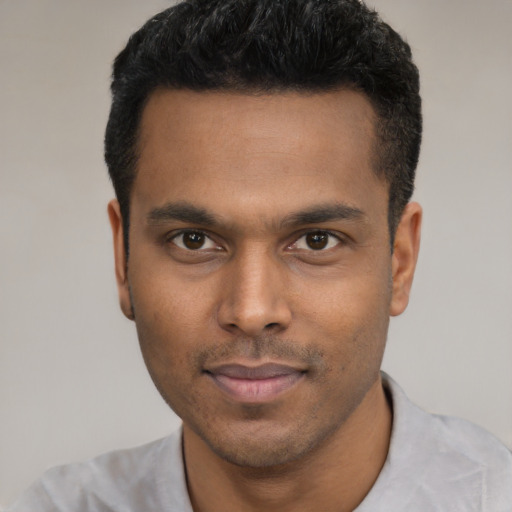 Neutral latino young-adult male with short  black hair and brown eyes