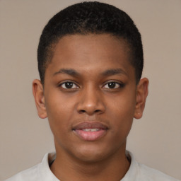 Joyful black young-adult male with short  brown hair and brown eyes