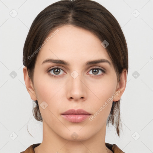 Neutral white young-adult female with short  brown hair and brown eyes