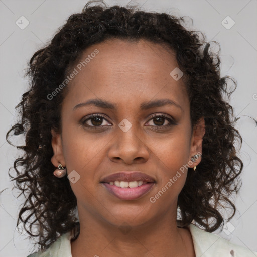 Joyful black young-adult female with long  brown hair and brown eyes