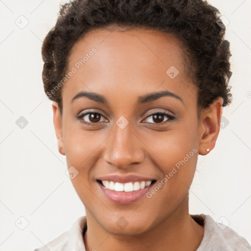 Joyful latino young-adult female with short  brown hair and brown eyes