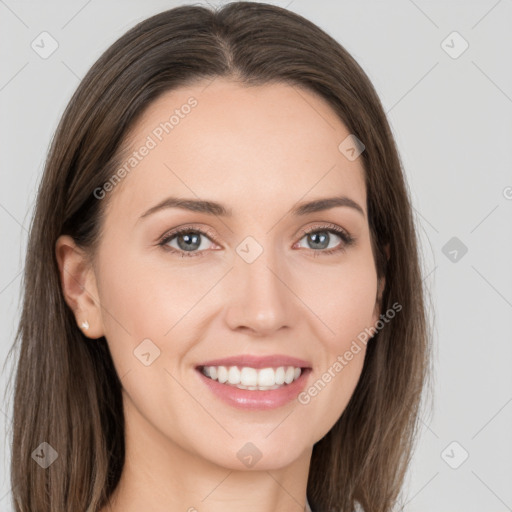 Joyful white young-adult female with long  brown hair and grey eyes