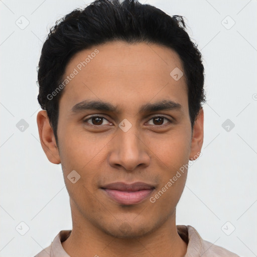 Joyful asian young-adult male with short  black hair and brown eyes