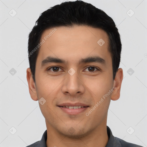 Joyful white young-adult male with short  black hair and brown eyes