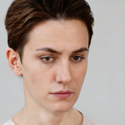 Neutral white young-adult female with short  brown hair and brown eyes