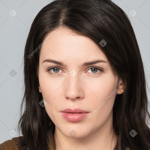 Neutral white young-adult female with long  brown hair and brown eyes