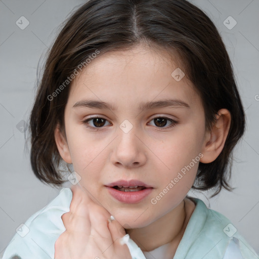 Joyful white child female with medium  brown hair and brown eyes